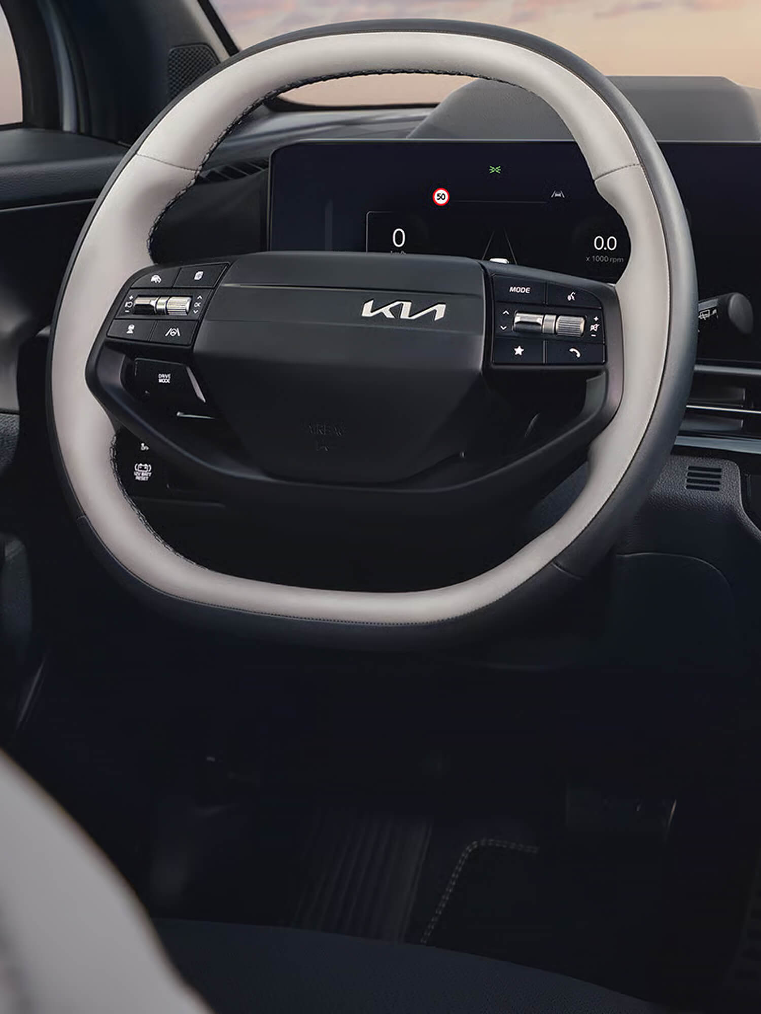 as Bild zeigt das Auto von der Seite mit Fokus auf die Felge