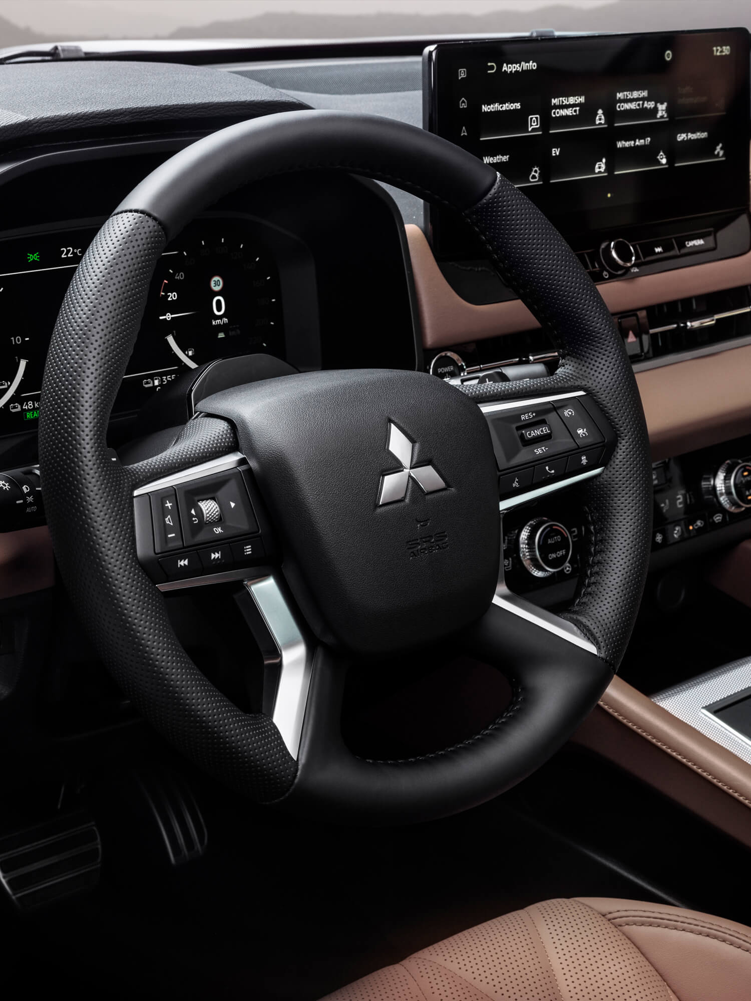 Das Bild zeigt das Lenkrad des Mitsubishi Outlander im Innenraum.